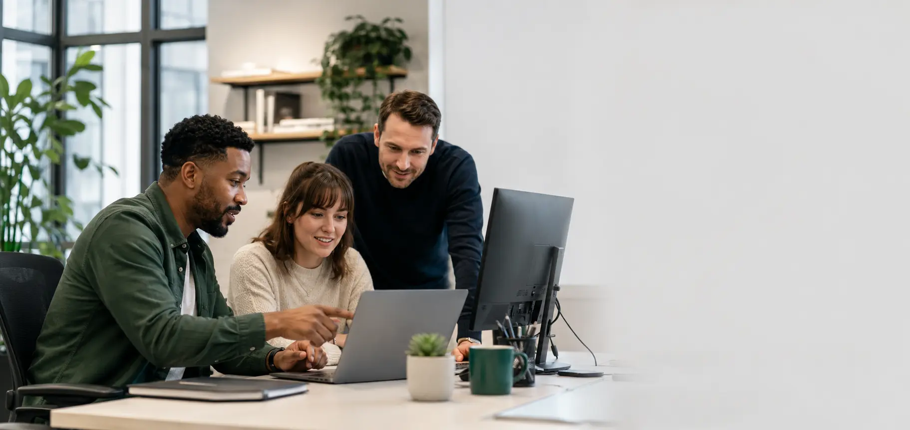 TechRevolve IT support professional helping a small business team